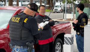 Agents from the California Department of Alcoholic Beverage Control pulled over a person in the red car for alcohol-related crime.